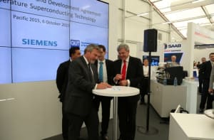 Dr Alex Zelinsky CEO DST Group signs the agreement with Siemens Australia CEO Jeff Connelly. Credit: Siemens Australia